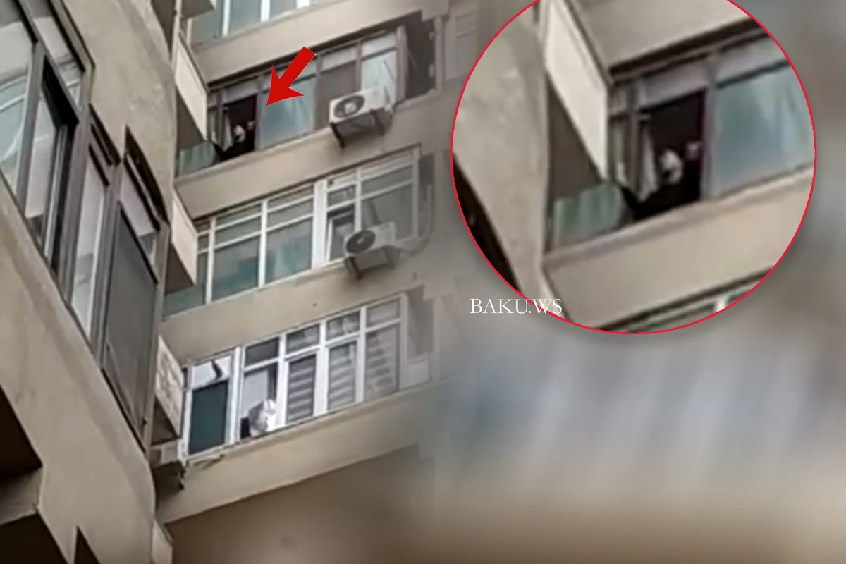 SON DƏQİQƏ! Bakıda kişi özünü binadan atmaq istəyir - VİDEO