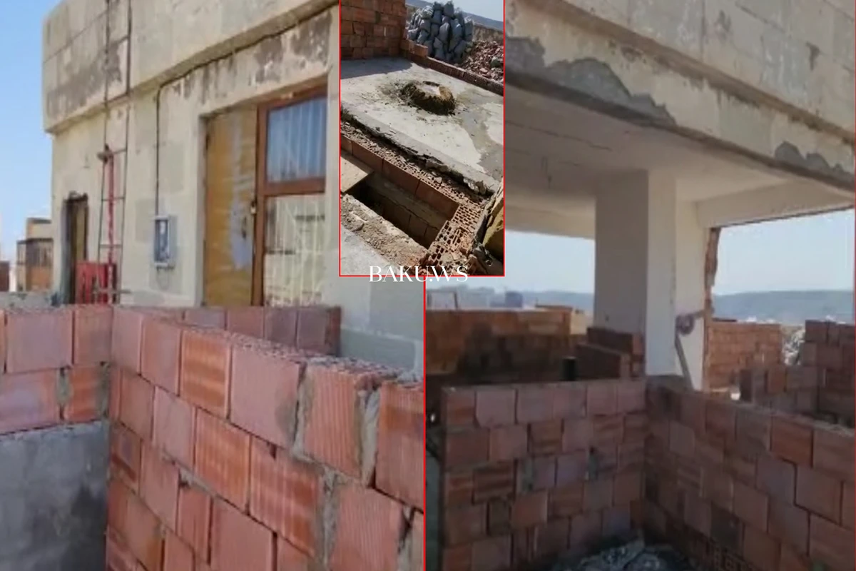 Binanın üstündə inşa edilən qanunsuz tikinti dayandırıldı - VİDEO