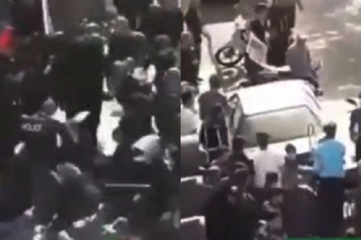 Təbrizdə narazı xalq prezidentin kortejinin qarışını kəsdi - VİDEO
