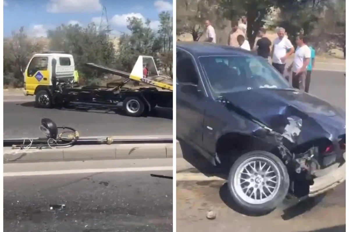 Bakıda BMW qəza törətdi - İşıq dirəyi aşdı - VİDEO