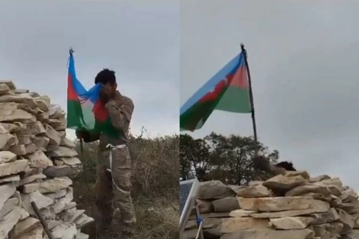 Əsgərimiz Xocalıya Azərbaycan Bayrağını sancdı - VİDEO
