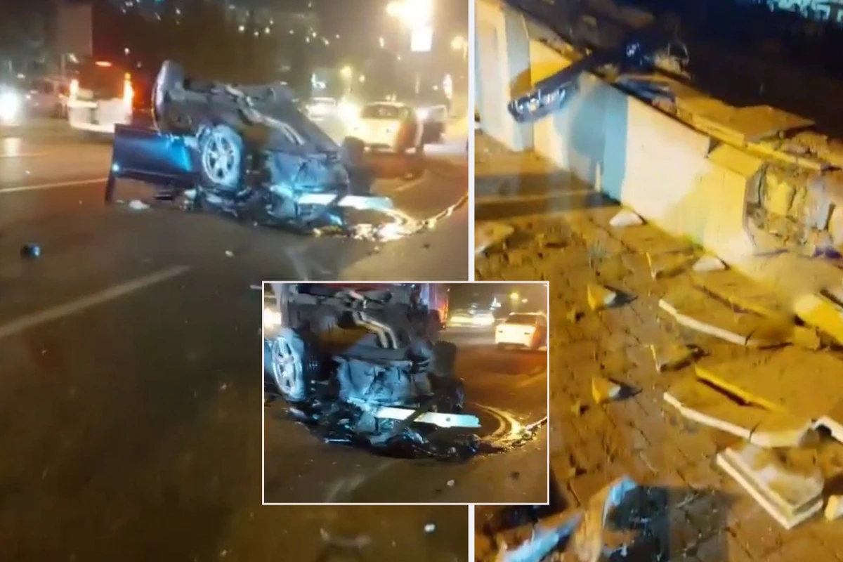В Баку по вине работника автомойки перевернулся BMW - ВИДЕО
