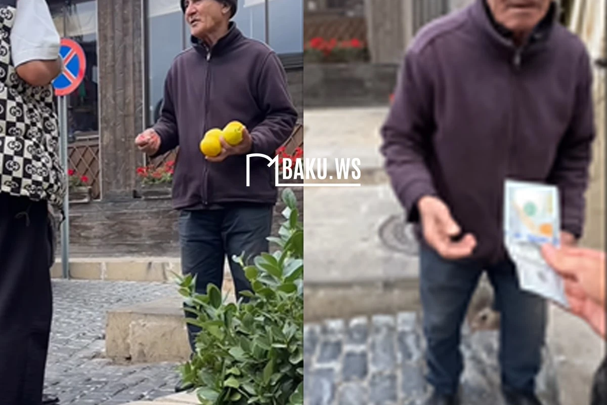 Hüseyn Həsənov yaşlı kişidən limon alıb 100 dollar verdi - VİDEO