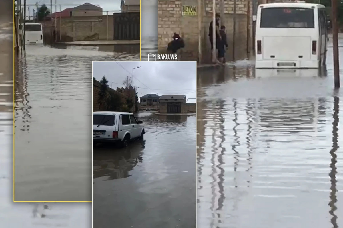 Bakıda Niva yağış suyu yığılan yolda qaldı - VİDEO