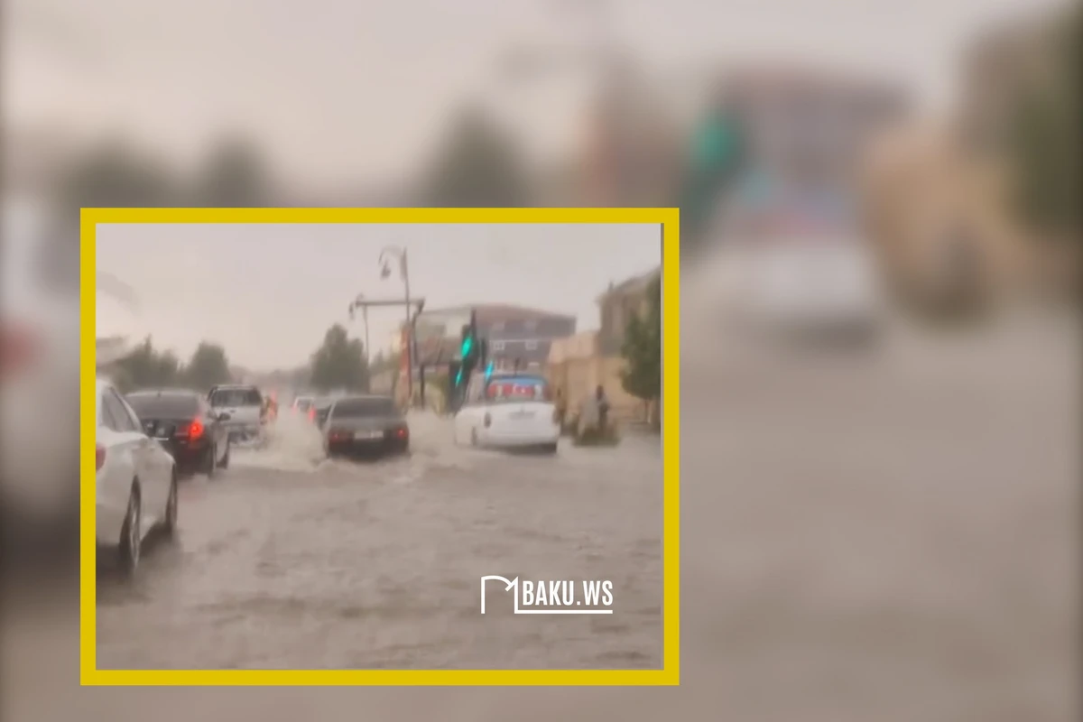 Непроходимые улицы Баладжары: последствия сильного дождя в Баку - ВИДЕО