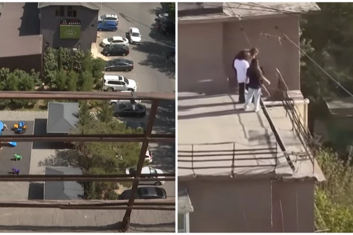 In Baku, girls organized an extreme entertainment on the roof of a high-rise building In Baku, girls organized an extreme entertainment on the roof of a high-rise building