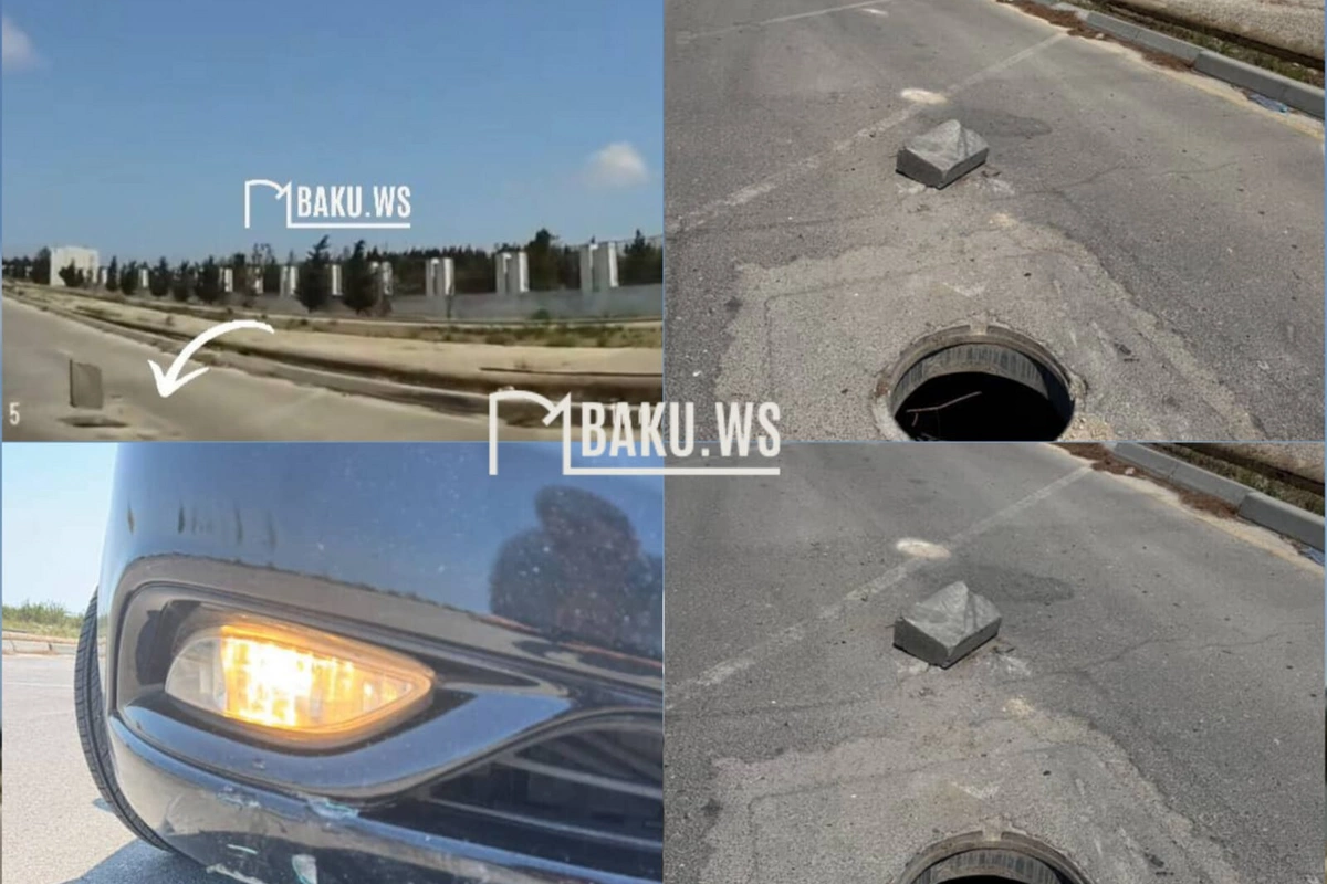 Bakıda yolda açıq qalan lükə görə avtomobilə zərər dəydi Bakıda yolda açıq qalan lükə görə avtomobilə zərər dəydi