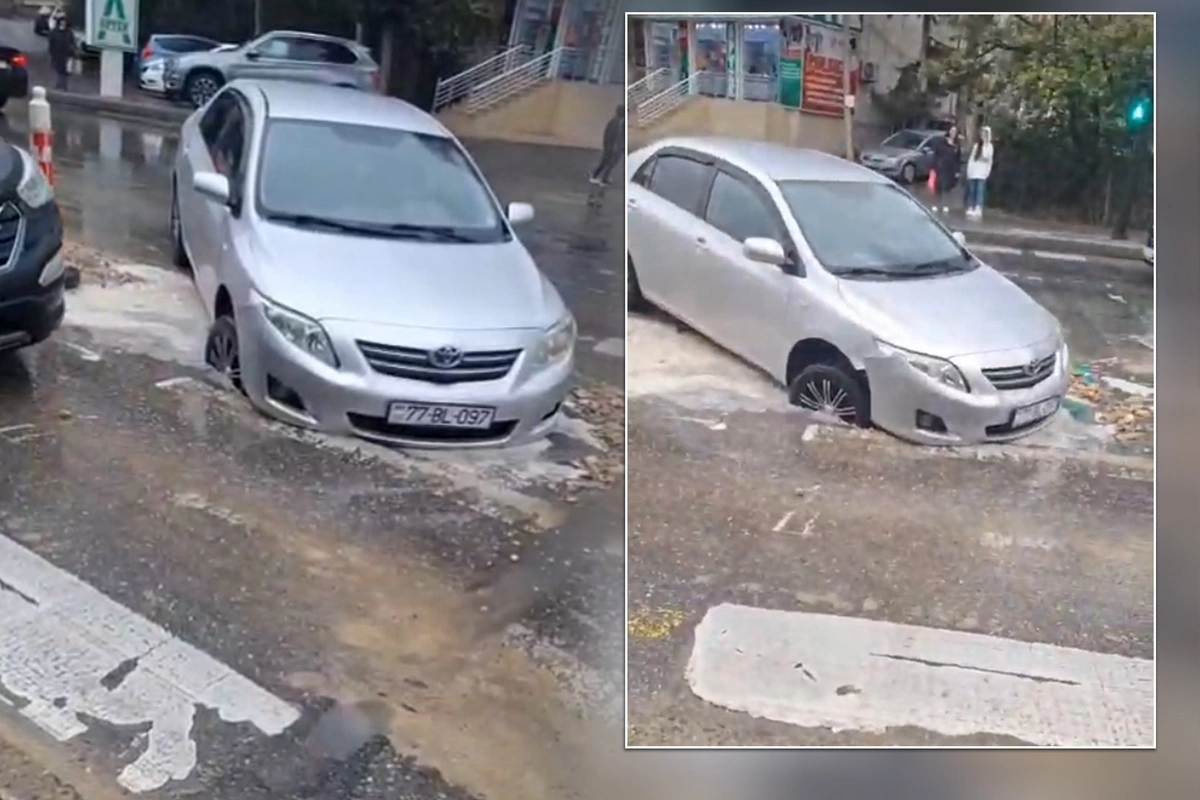 Bakıda maşın yolda qazılmış çuxura düşüb Bakıda maşın yolda qazılmış çuxura düşüb