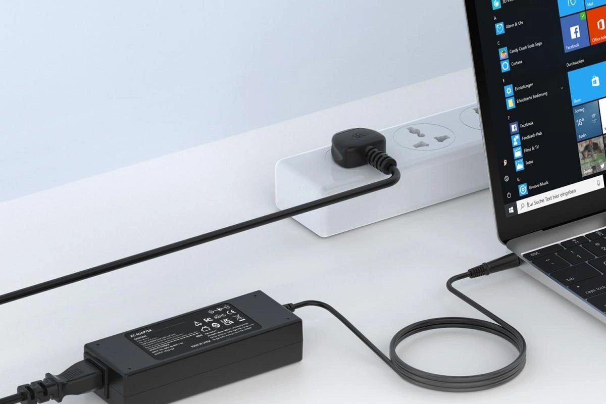 Что это за черная коробка на зарядке для ноутбука