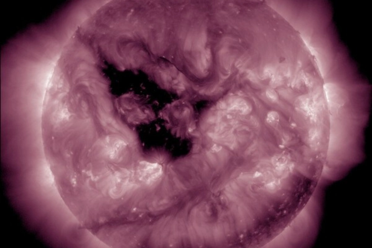 A large coronal hole has begun to grow on the Sun