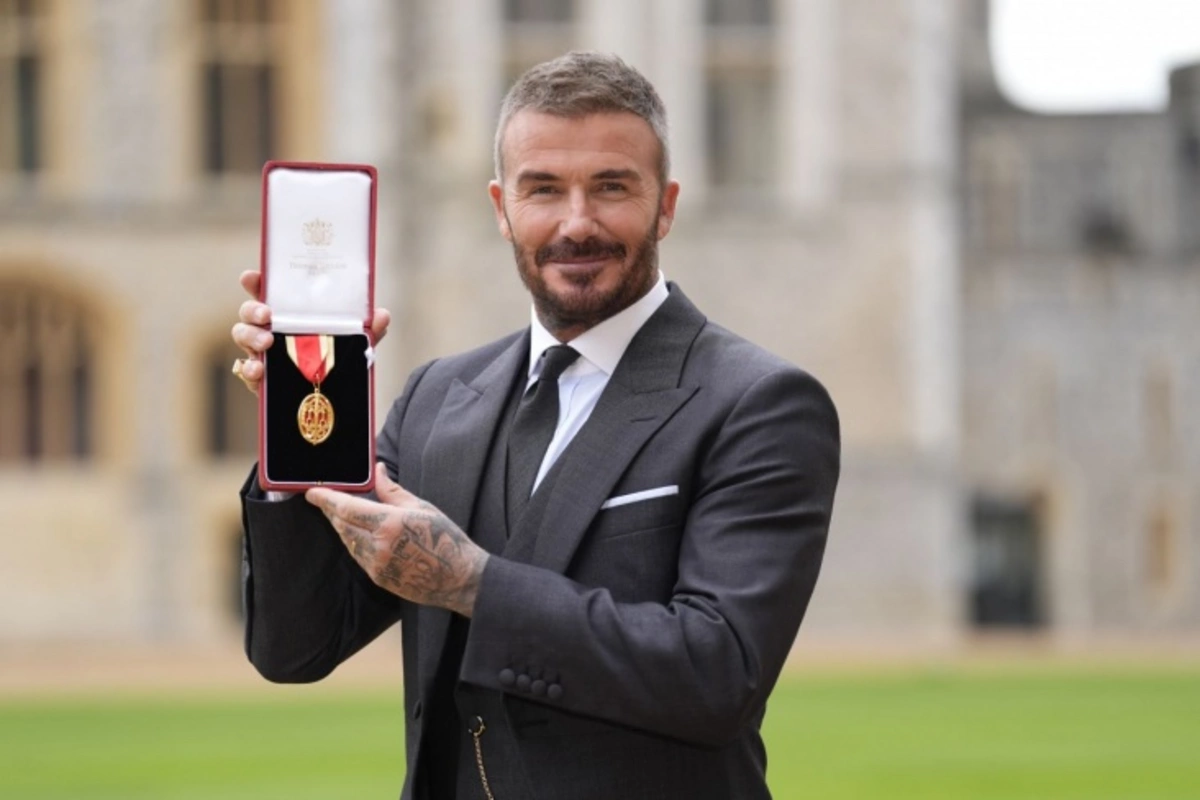 King of Great Britain Charles III knighted David Beckham