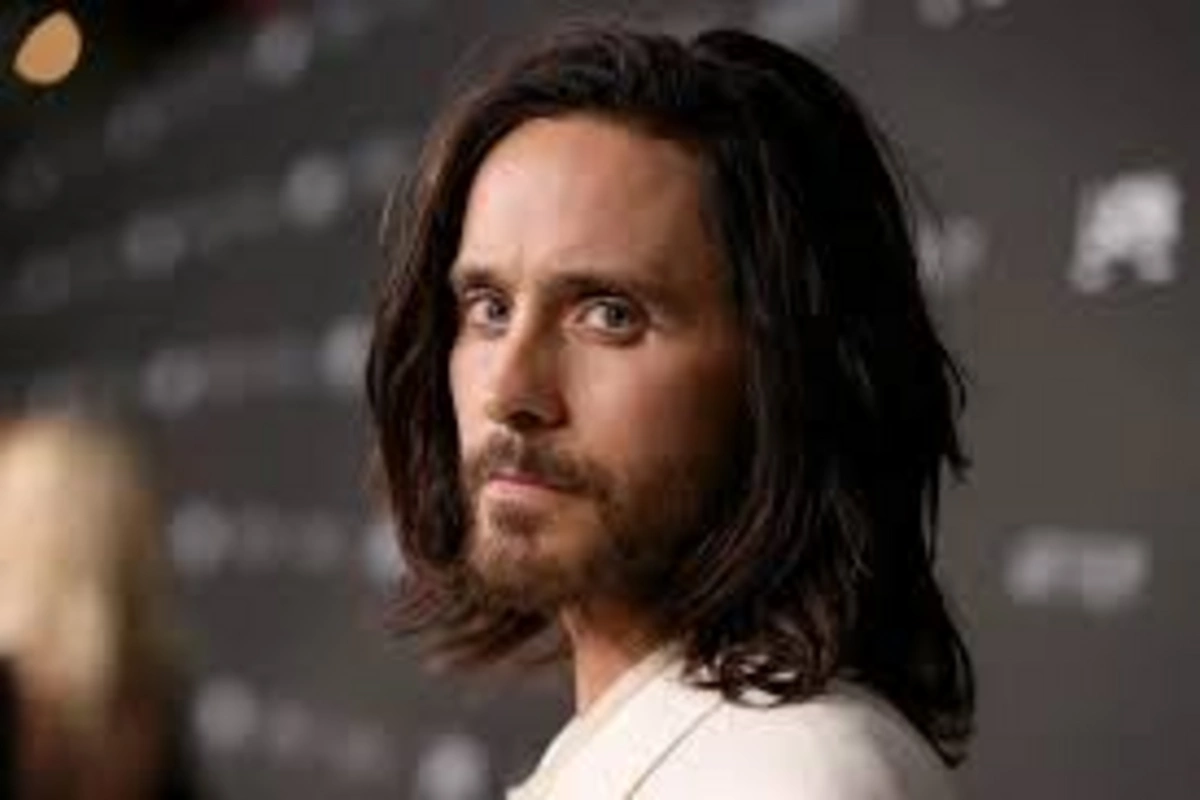 Jared Leto bathed in icy water against the backdrop of snow-covered mountains Jared Leto bathed in icy water against the backdrop of snow-covered mountains