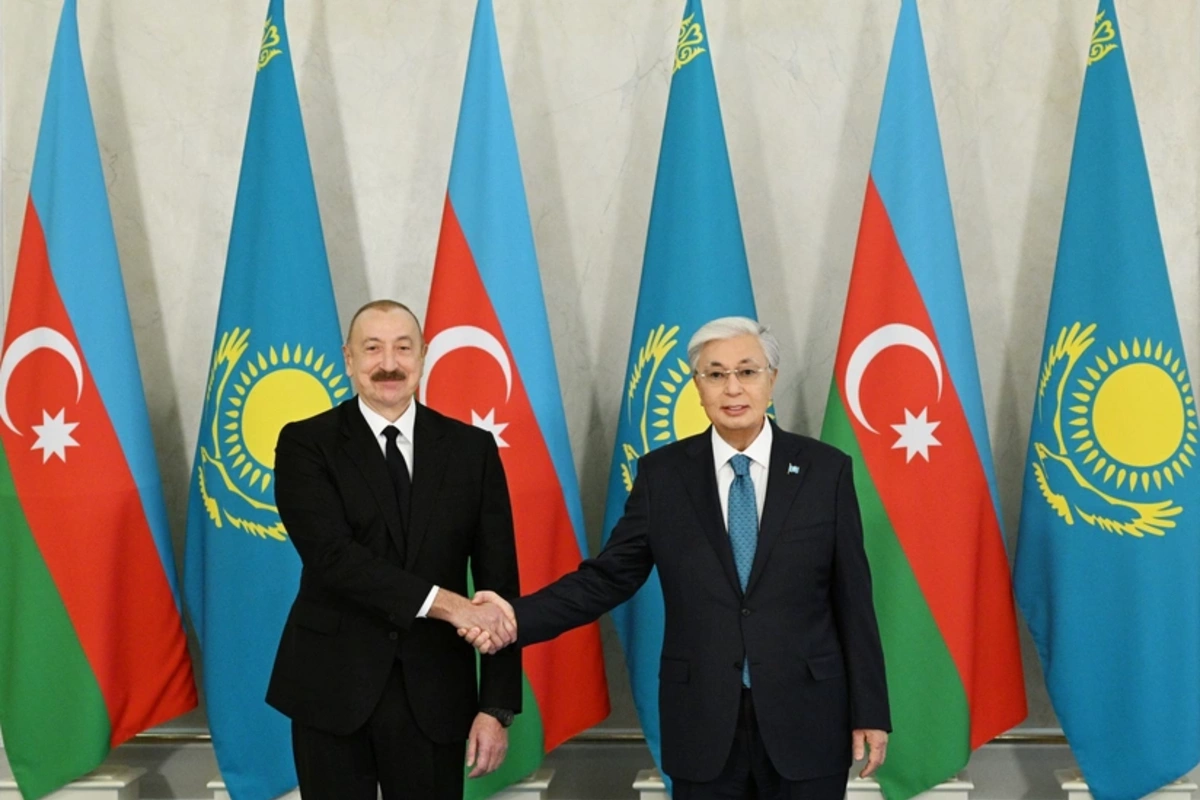 Kassym-Jomart Tokayev gifted Ilham Aliyev a traditional Kazakh chapan Kassym-Jomart Tokayev gifted Ilham Aliyev a traditional Kazakh chapan
