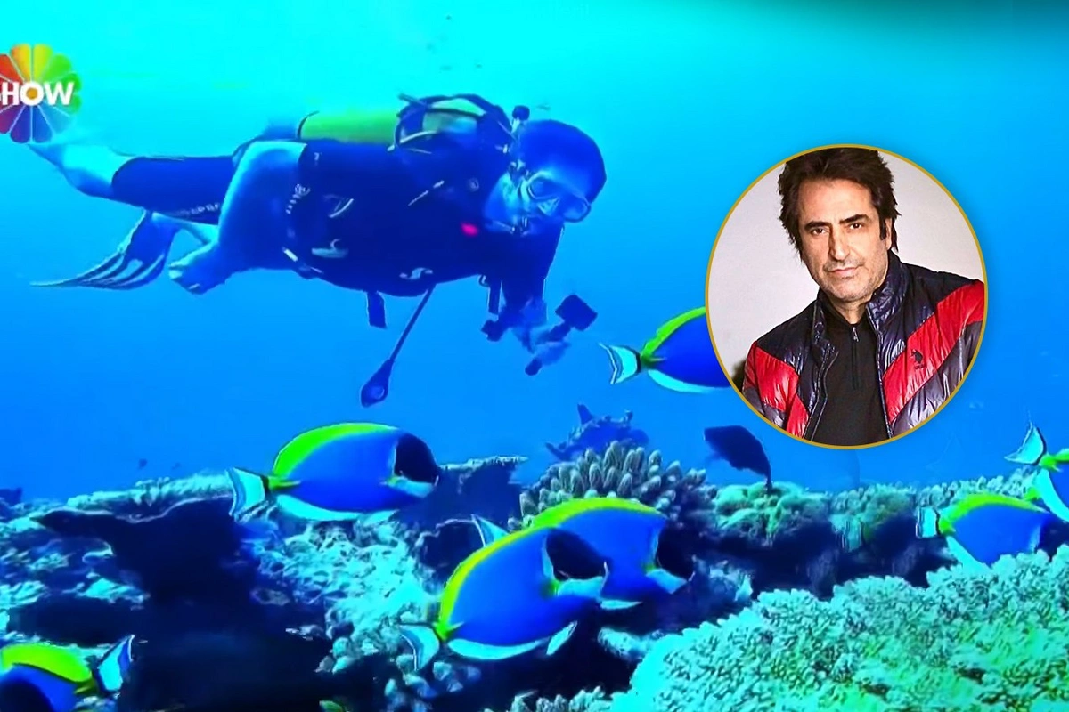 Mahsun Kırmızıgül Hind Okeanında 3 köpək balığı ilə üzdü