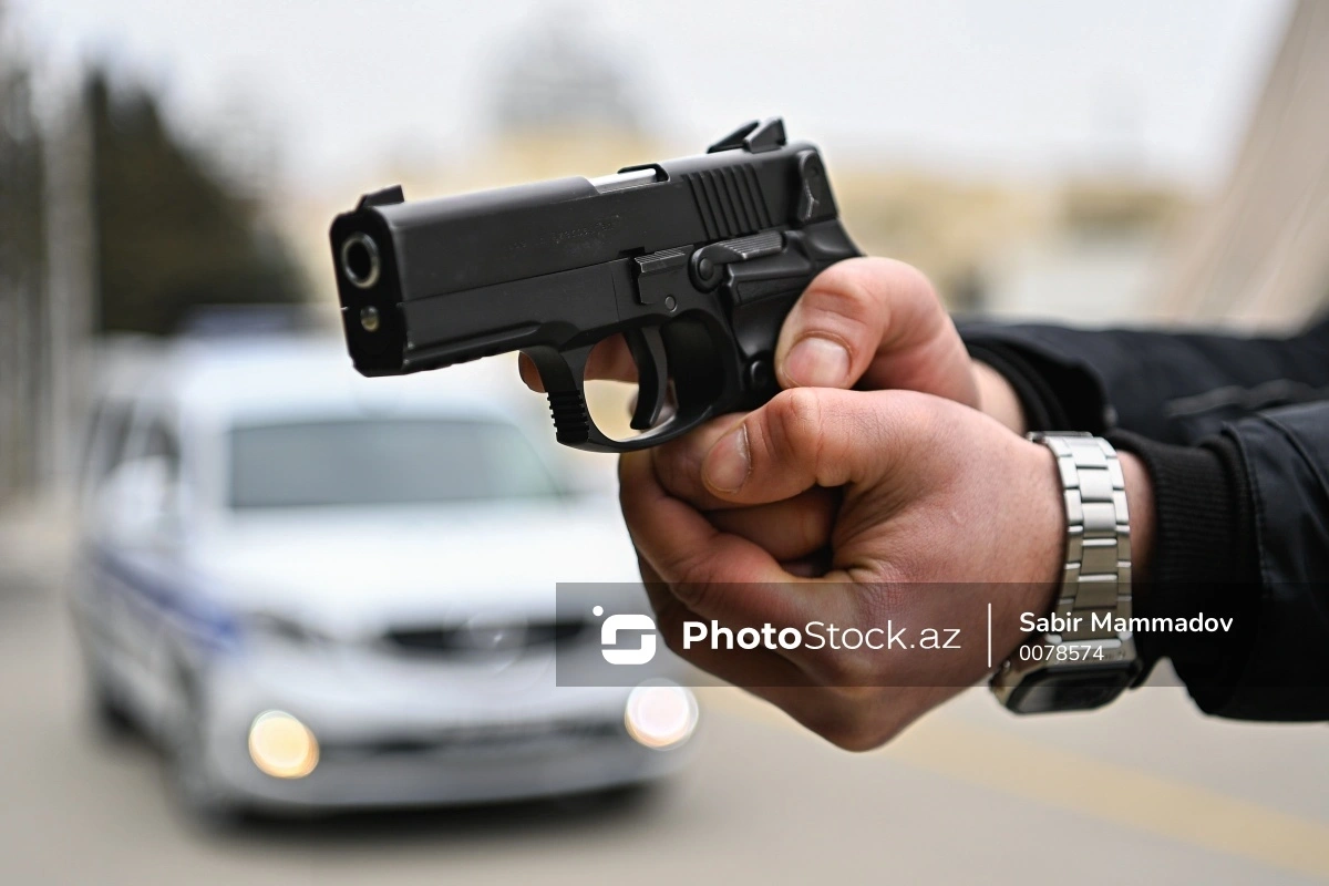 Gürcüstanda Marneuli bazarında ata və oğul güllələndilər