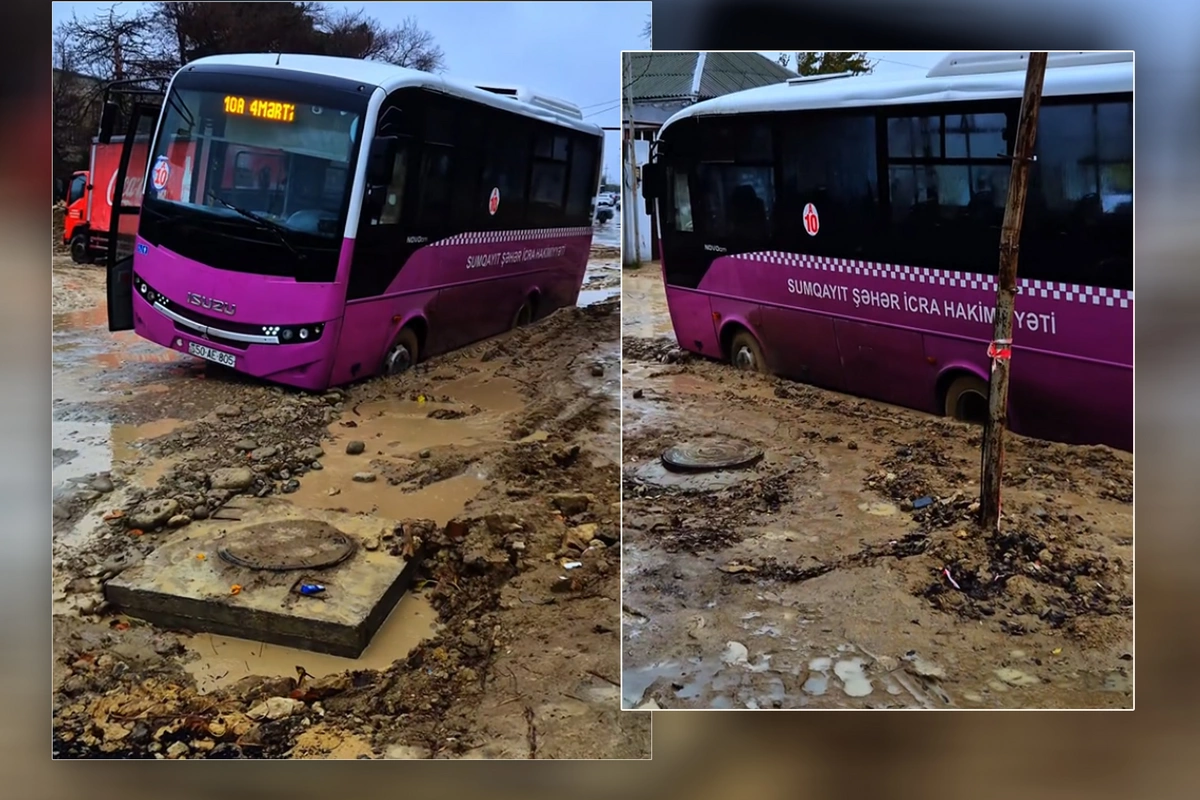 В Сумгайыте автобус и грузовик застряли в грязи на дороге возле школы