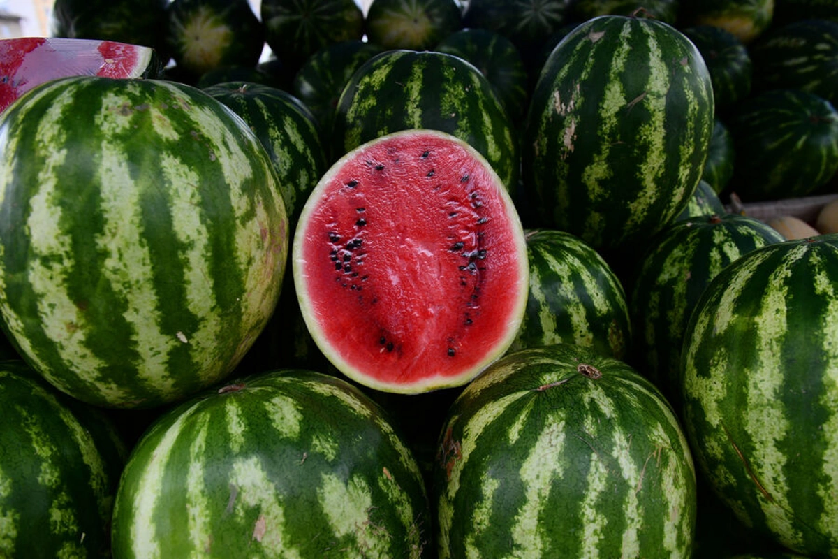 What are the risks of overeating watermelon?