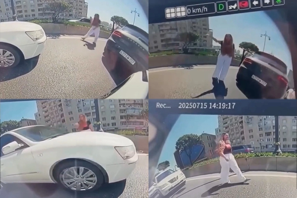 Bakıda sürücü yolun ortasında maşını saxlayıb mübahisə etdi, hərəkət iflic oldu Bakıda sürücü yolun ortasında maşını saxlayıb mübahisə etdi, hərəkət iflic oldu