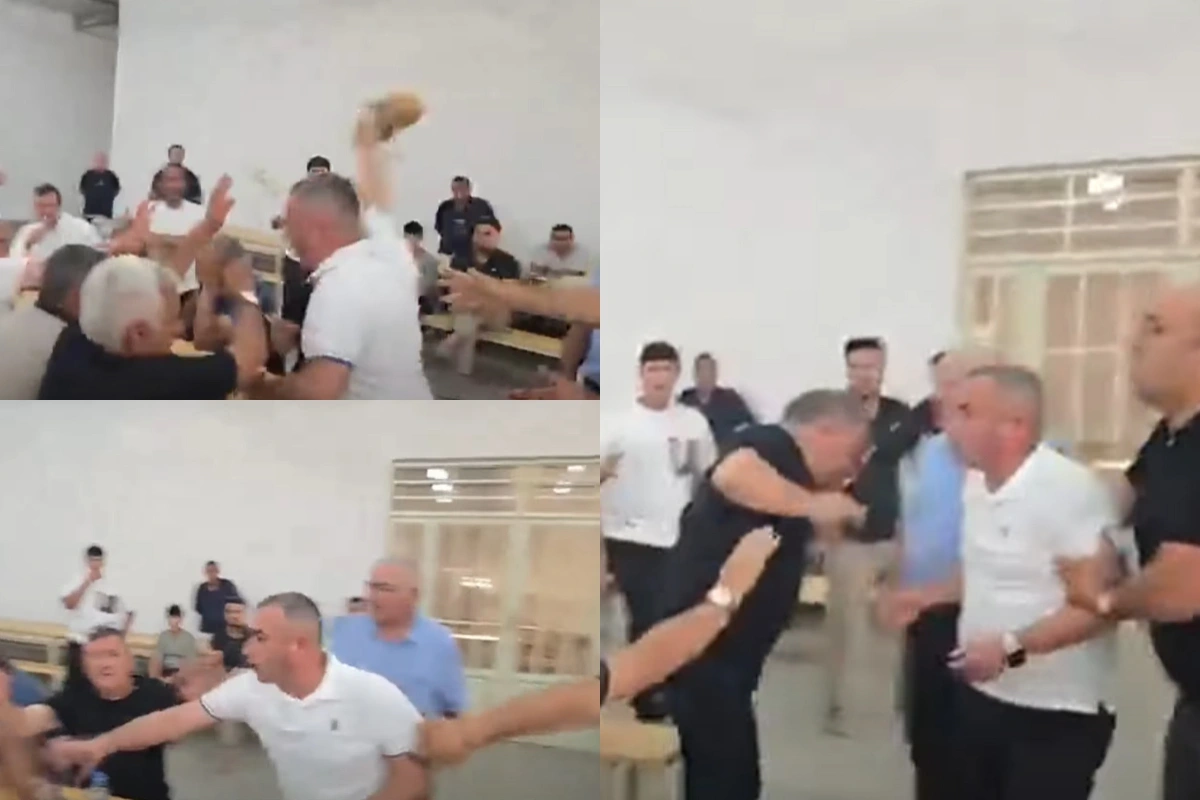 Azərbaycanəsilli deputat onu təhqir edən seçiciyə çaynik atdı Azərbaycanəsilli deputat onu təhqir edən seçiciyə çaynik atdı