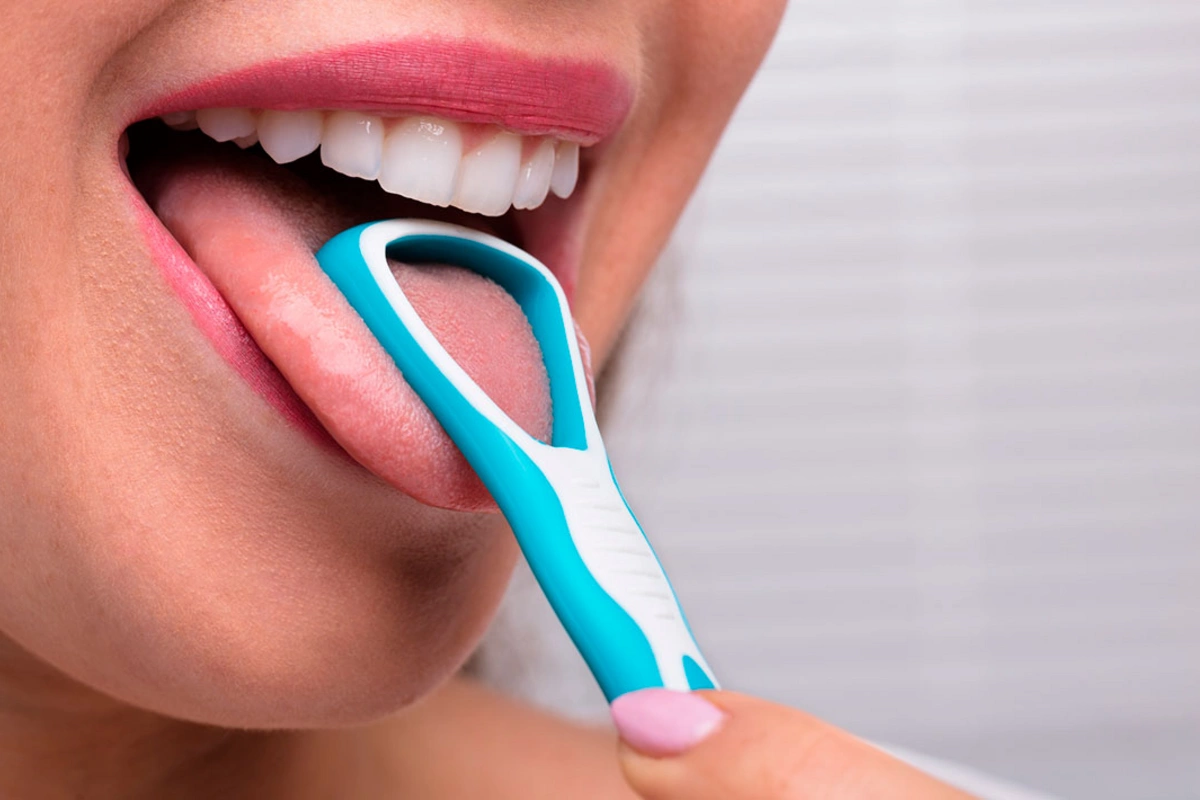 Why is it important to clean your tongue and how to do it properly?