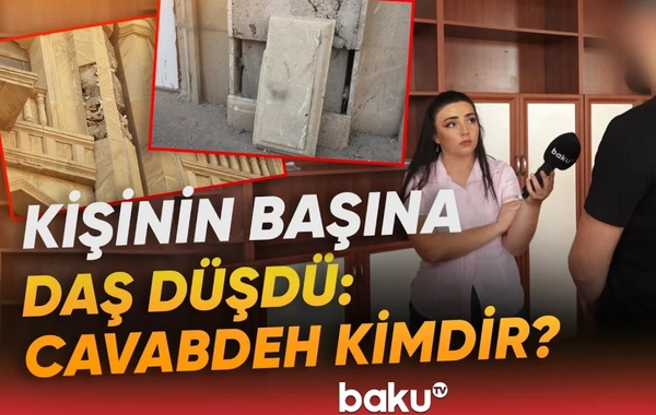 Ticarət mərkəzinin yanından keçən kişinin üzərinə daş düşdü: Problemi kim həll etməlidir?