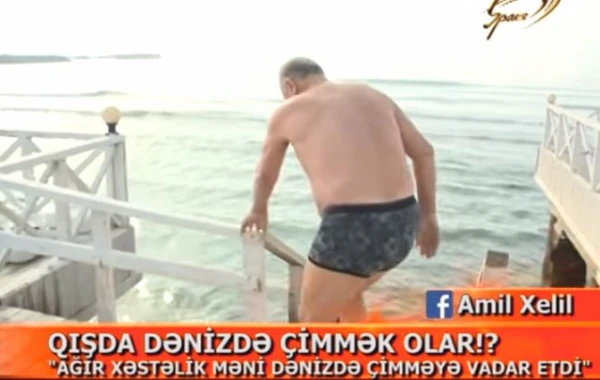 Bakıda 70 yaşlı kişi soyuq havada dənizdə çimdi (VİDEO)