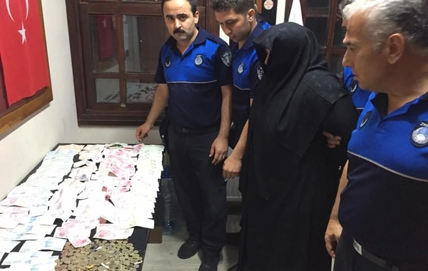 Dilənçi qadının üstündən 18 min pul çıxdı - VİDEO