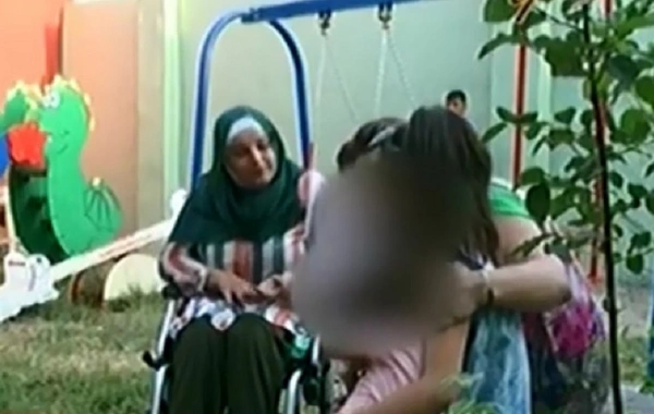 Bakıda evsiz qalan uşaqlara fiziki qüsurlu xanım sahib çıxdı - VİDEO