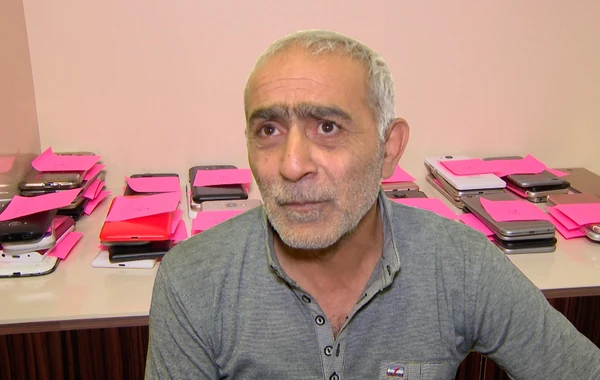 Bu ağsaqqal bir gecədə mağazadan 73 telefon oğurladı - FOTO