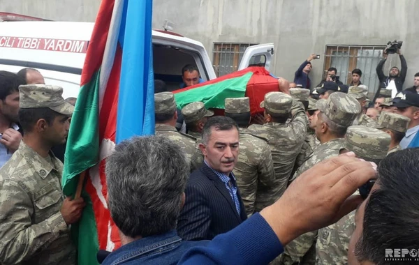 Şəhid əsgərimizin meyiti Azərbaycana qaytarıldı - FOTO