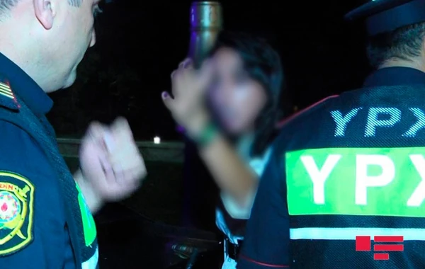 Bakıda sərxoş qadın özündən çıxdı - polisə çətin anlar yaşatdı - VİDEO