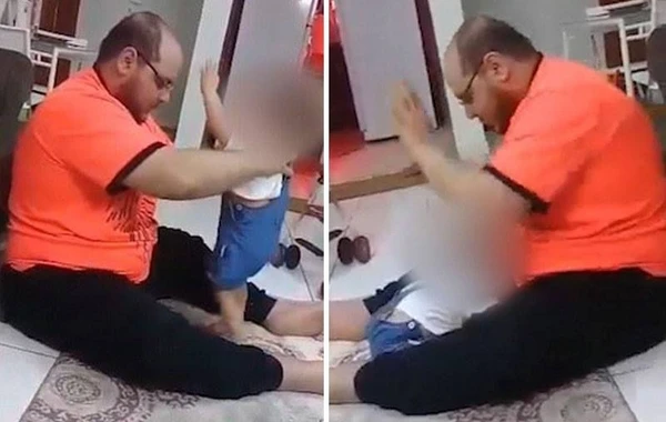 Ata körpəsini gəzə bilmədiyi üçün döydü - VİDEO