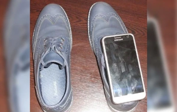 Məhkuma gətirilən ayaqqabının içərisində telefon çıxdı