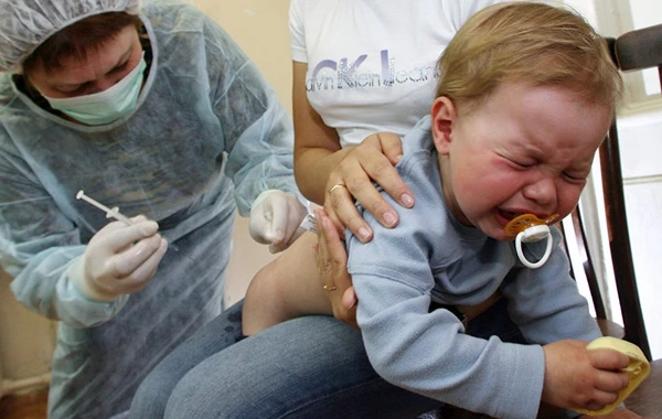 Gürcüstanda uşaqlar arasında virus tüğyan edir - Hər gün azı 100 xəstə
