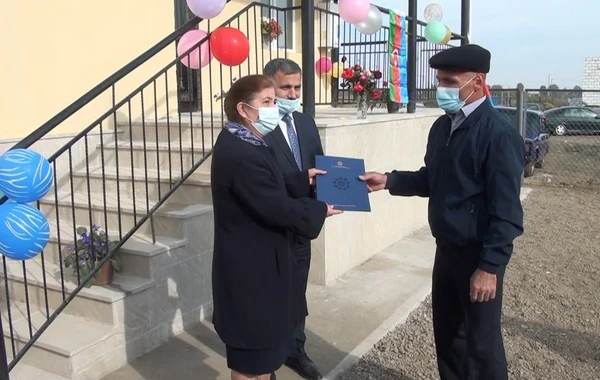 Şəhid ailələri və qazilərə evlər paylandı - FOTO