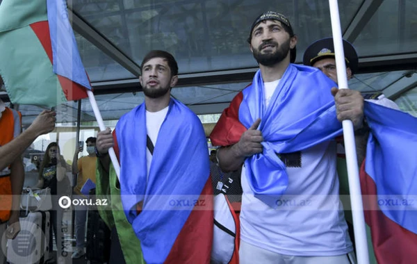 Ermənini məğlub edən azərbaycanlı MMA döyüşçüsü Vətənə qayıtdı - FOTOREPORTAJ