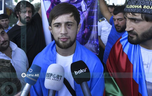 Ermənini məğlub edən azərbaycanlı MMA döyüşçüsü Vətənə qayıtdı - FOTOREPORTAJ