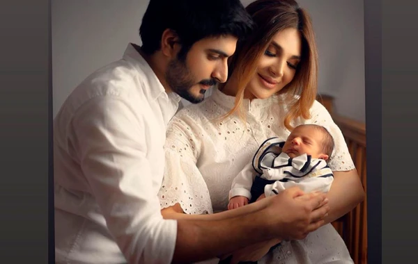Tanınmış cütlüyün övladının xoş günü - FOTO