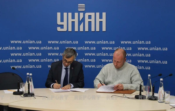 Report подписал меморандум о сотрудничестве с украинским агентством УНИАН - ФОТО