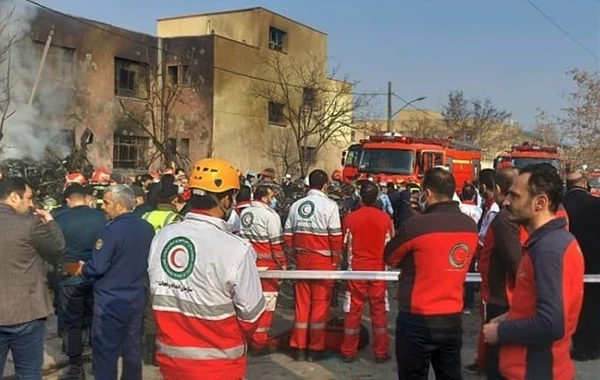 Təbrizdə döyüş təyyarəsi idman zalının üzərinə düşdü: 3 ölü - VİDEO