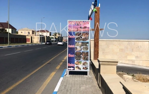 İcra Hakimiyyəti səki düzəltdi, restoran qabağına plakat qoydu - FOTO