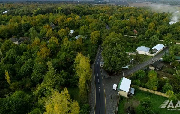 Qəbələdə 10 yaşayış məntəqəsini əhatə edən yollar yenidən qurulub - VİDEO/FOTO