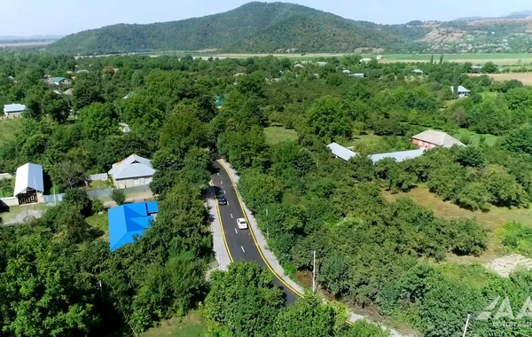 Qəbələdə 10 yaşayış məntəqəsini əhatə edən yollar yenidən qurulub - VİDEO/FOTO