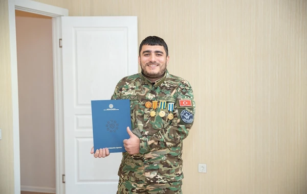 Gəncədə şəhid ailələrinə və müharibə əlillərinə 30 mənzil təqdim edilib - FOTO