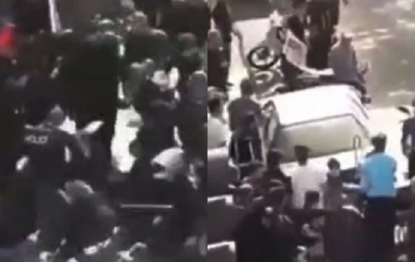 Təbrizdə narazı xalq prezidentin kortejinin qarışını kəsdi - VİDEO