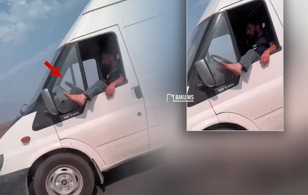 Sürücü magistral yolda ayağını pəncərədən çıxarıb avtomobil idarə etdi - VİDEO