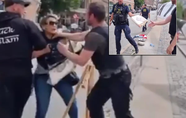 "Quran"ın yandırılmasına qarşı çıxan qadına polisdən sərt davranış - VİDEO