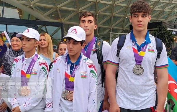 Sloveniyada möhtəşəm nəticə əldə edən Azərbaycan cüdoçuları Vətənə qayıdıblar - FOTO