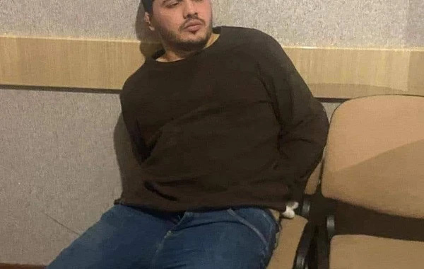 Ailəsini baltalamaqda şübhəli bilinən Əhmədin SAXLANILMA ANI - FOTO