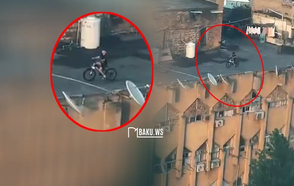 Bakıda TƏHLÜKƏLİ OLAY: Azyaşlı binanın damında velosiped sürdü